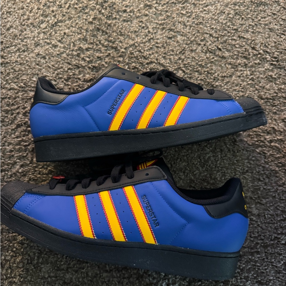 Adidas Superstar Black and Blue with Yellow Stripes
